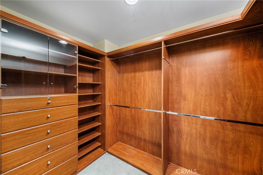 2241 Redwood Drive Glendora, CA 91741 - Photo 29 of 68 a view of walk in closet with empty racks