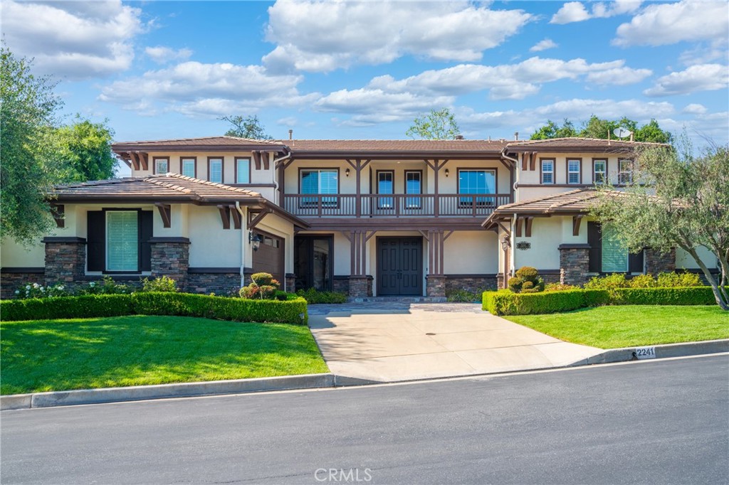 2241 Redwood Drive Glendora, CA 91741 - Photo 5 of 68 a front view of a house with a yard and garage