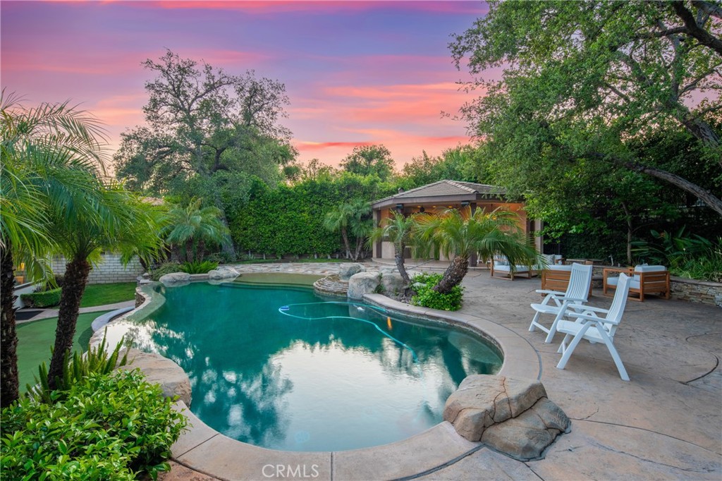 2241 Redwood Drive Glendora, CA 91741 - Photo 54 of 68 a view of a swimming pool with sitting area