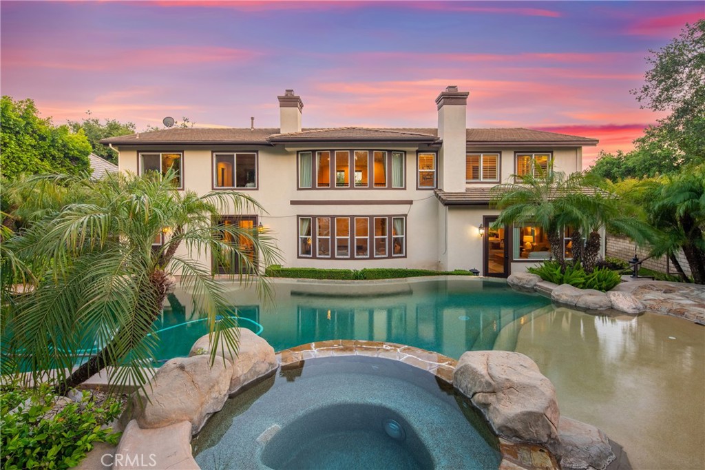 2241 Redwood Drive Glendora, CA 91741 - Photo 56 of 68 a front view of a house with a yard and a fountain