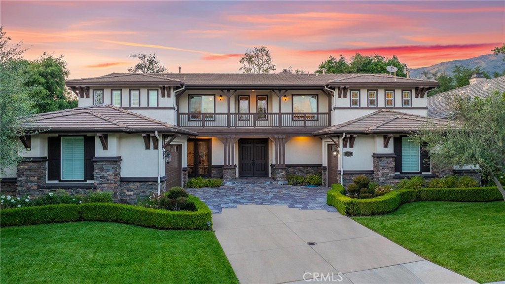 2241 Redwood Drive Glendora, CA 91741 - Photo 6 of 68 a front view of a residential apartment building with a yard