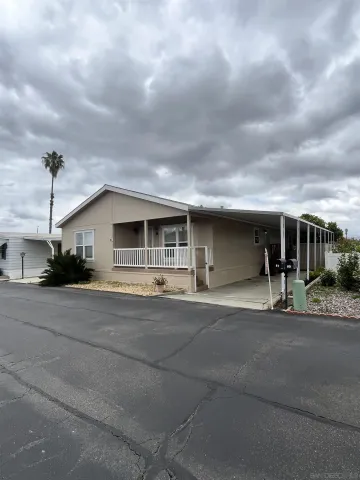 a front view of a house with a garage