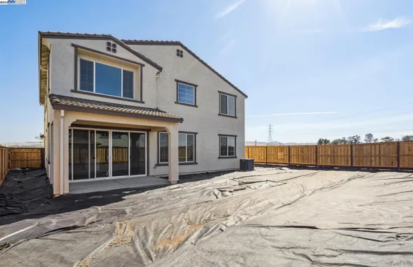 a view of a house with a roof deck