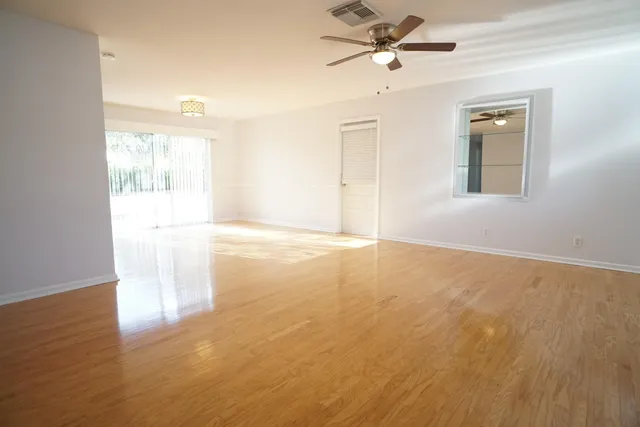 a view of an empty room and window