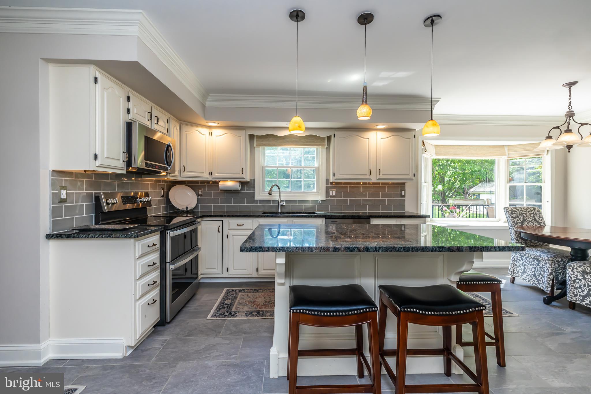 33 Collins Mill Road Chester Springs, PA 19425 - Photo 10 of 64 Showcases a classic subway tile backsplash