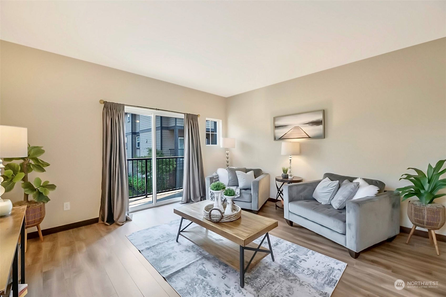 7100 Shinkle Place Southwest Seattle, WA 98106 - Photo 13 of 40 a living room with furniture and a potted plant