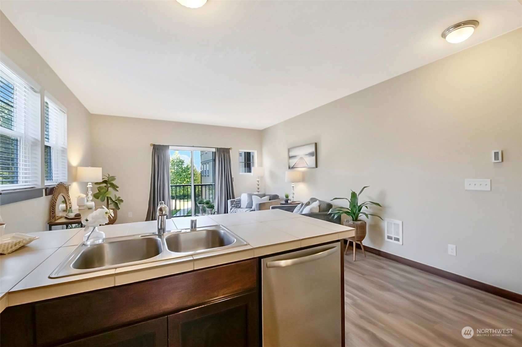 7100 Shinkle Place Southwest Seattle, WA 98106 - Photo 18 of 40 a kitchen with a sink and a window