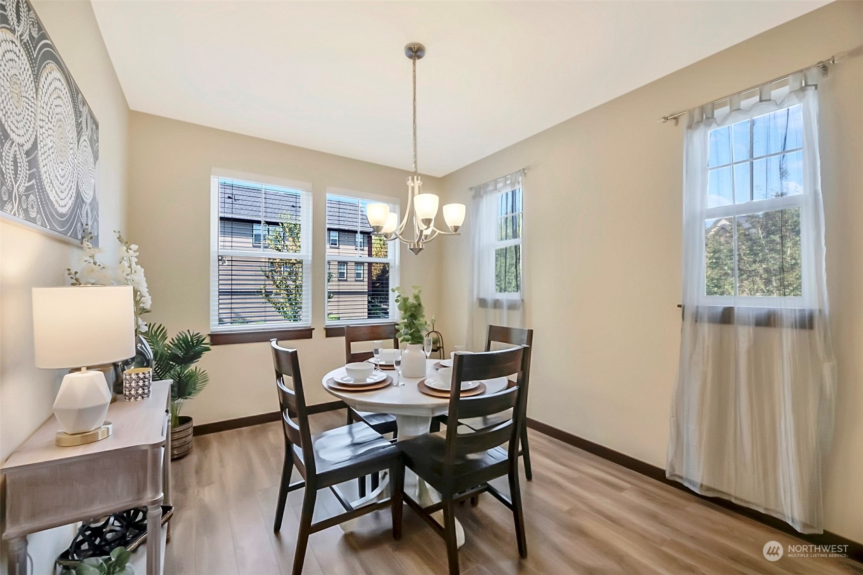 7100 Shinkle Place Southwest Seattle, WA 98106 - Photo 23 of 40 a view of a dining room with furniture window and wooden floor