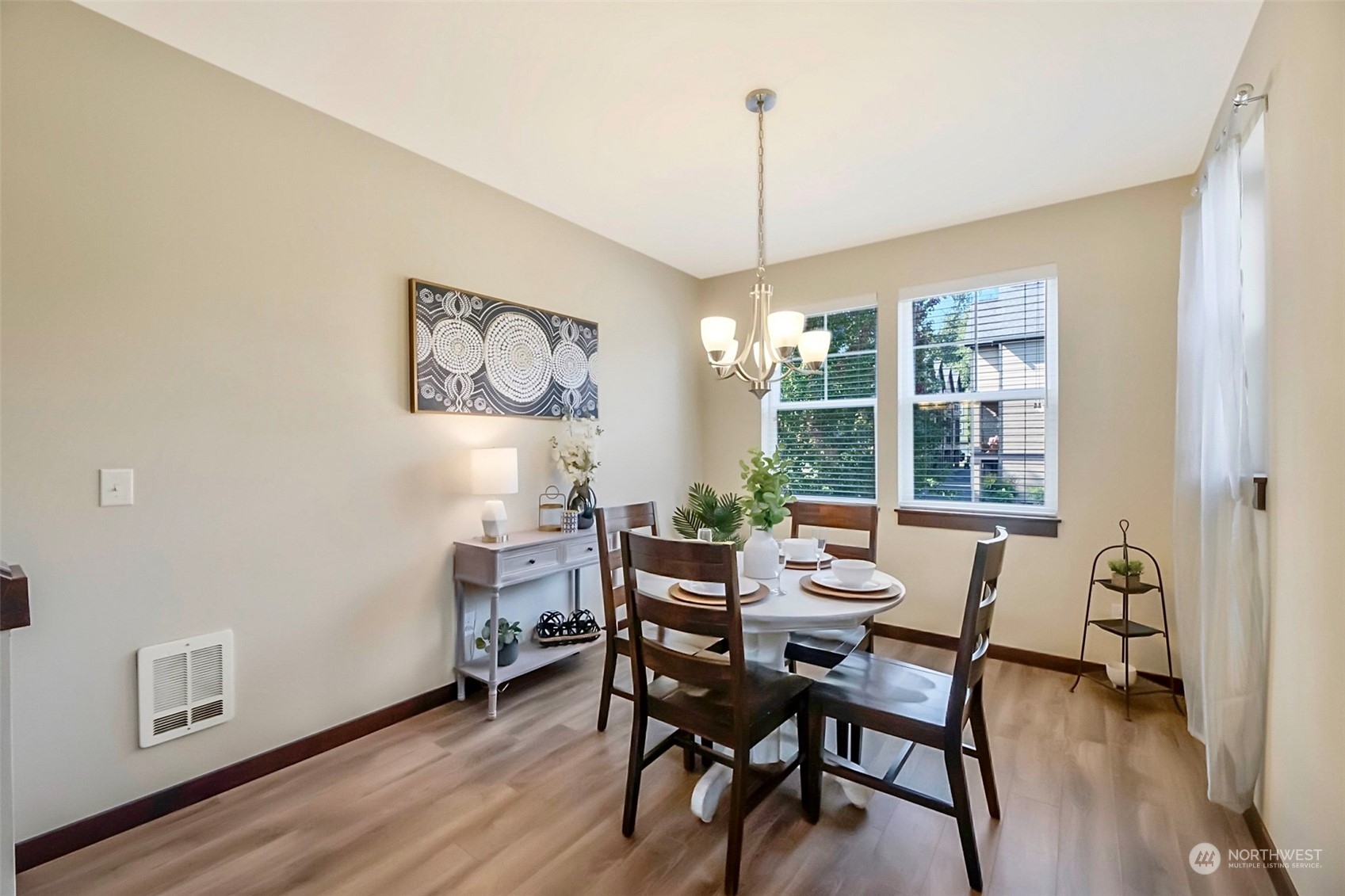 7100 Shinkle Place Southwest Seattle, WA 98106 - Photo 24 of 40 a dining room with furniture window wooden floor