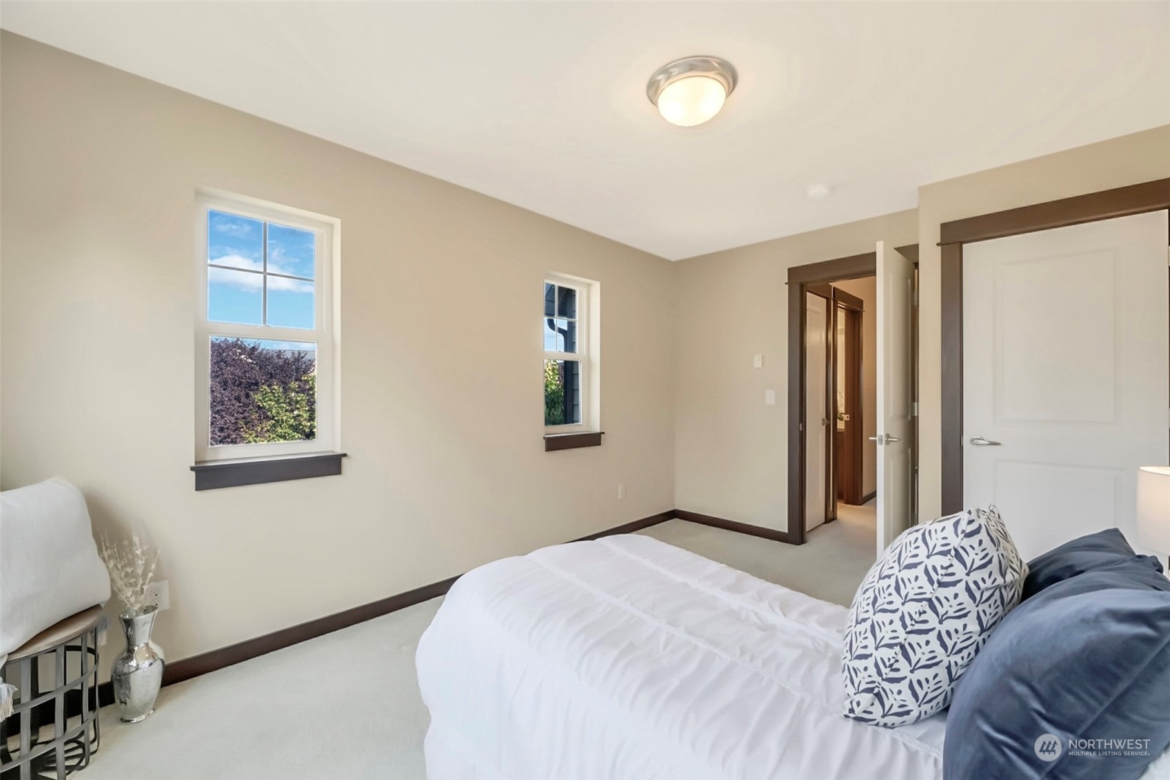 7100 Shinkle Place Southwest Seattle, WA 98106 - Photo 26 of 40 a bedroom with a bed and a window