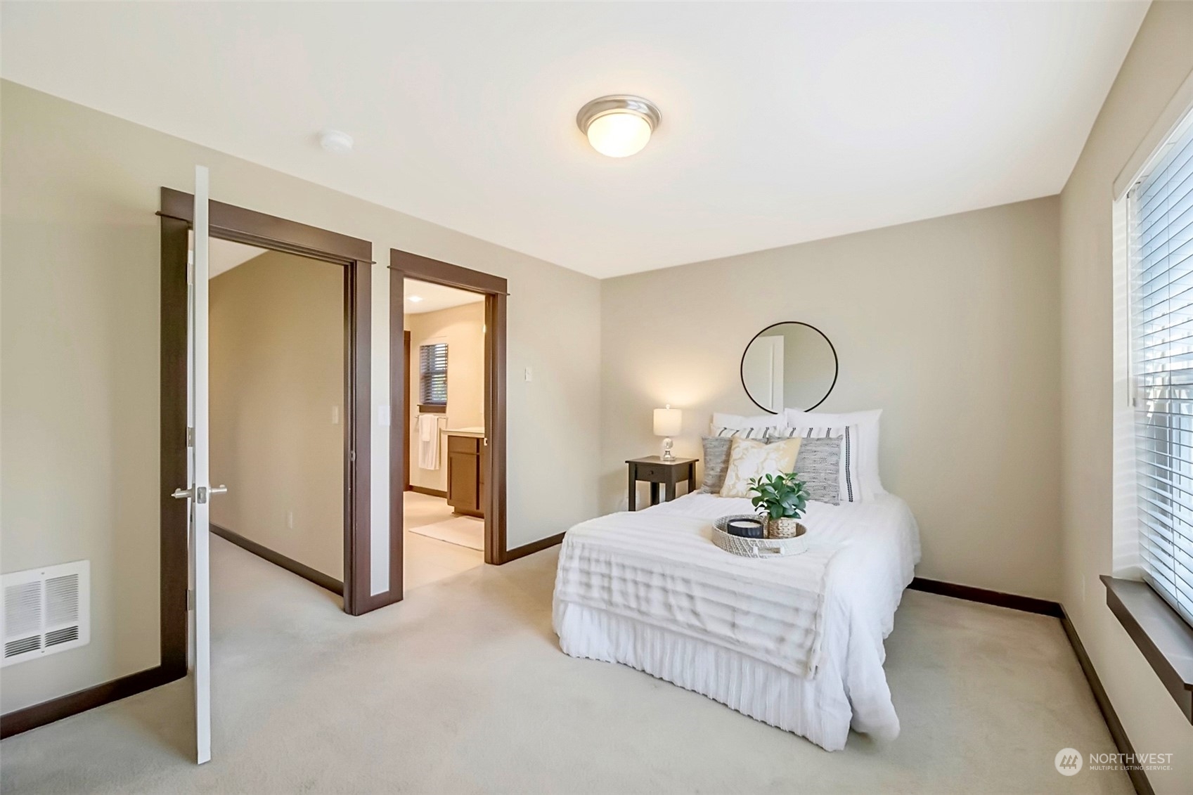 7100 Shinkle Place Southwest Seattle, WA 98106 - Photo 33 of 40 a bedroom with bed and window