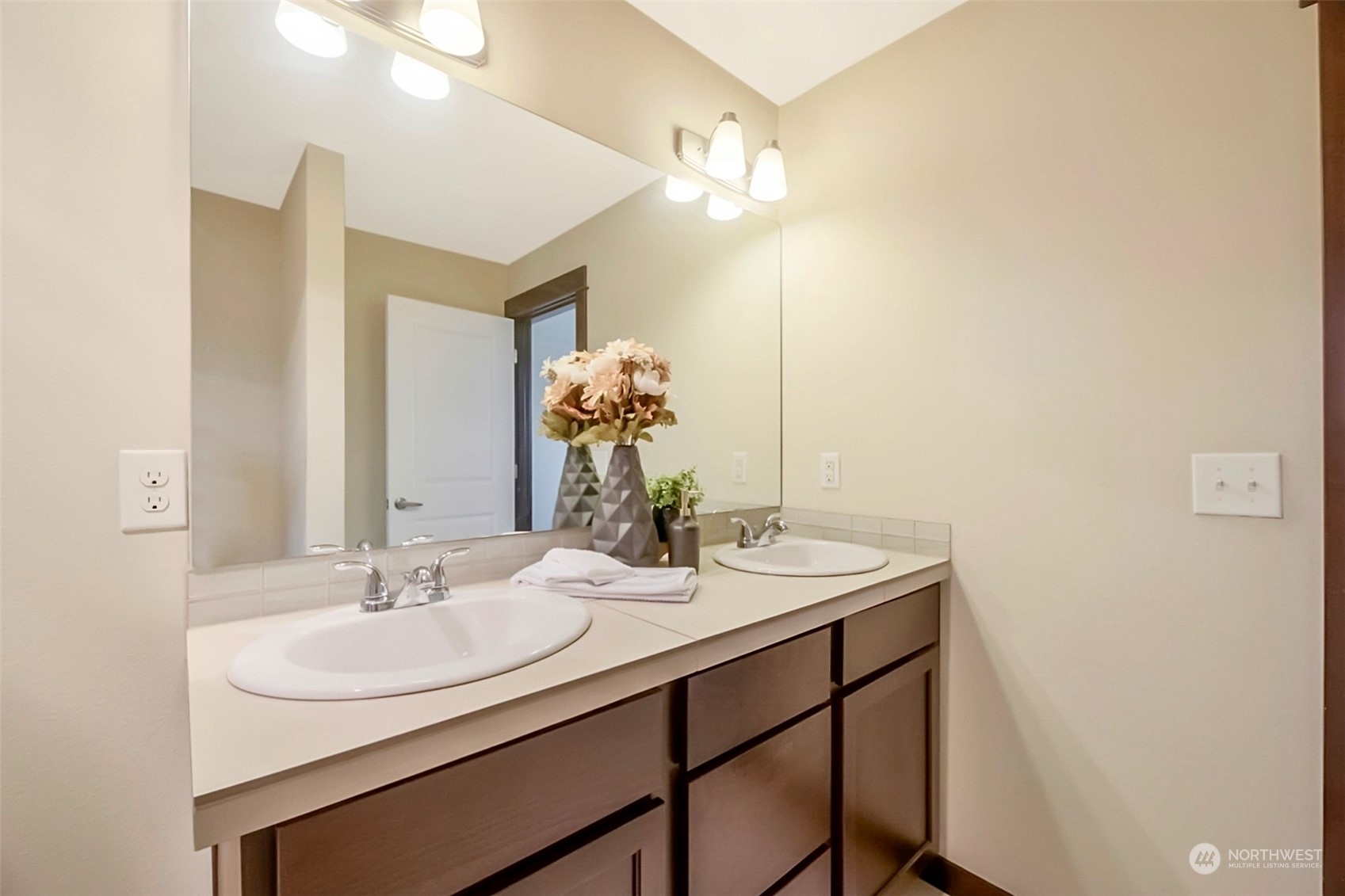 7100 Shinkle Place Southwest Seattle, WA 98106 - Photo 35 of 40 a bathroom with a sink and a mirror