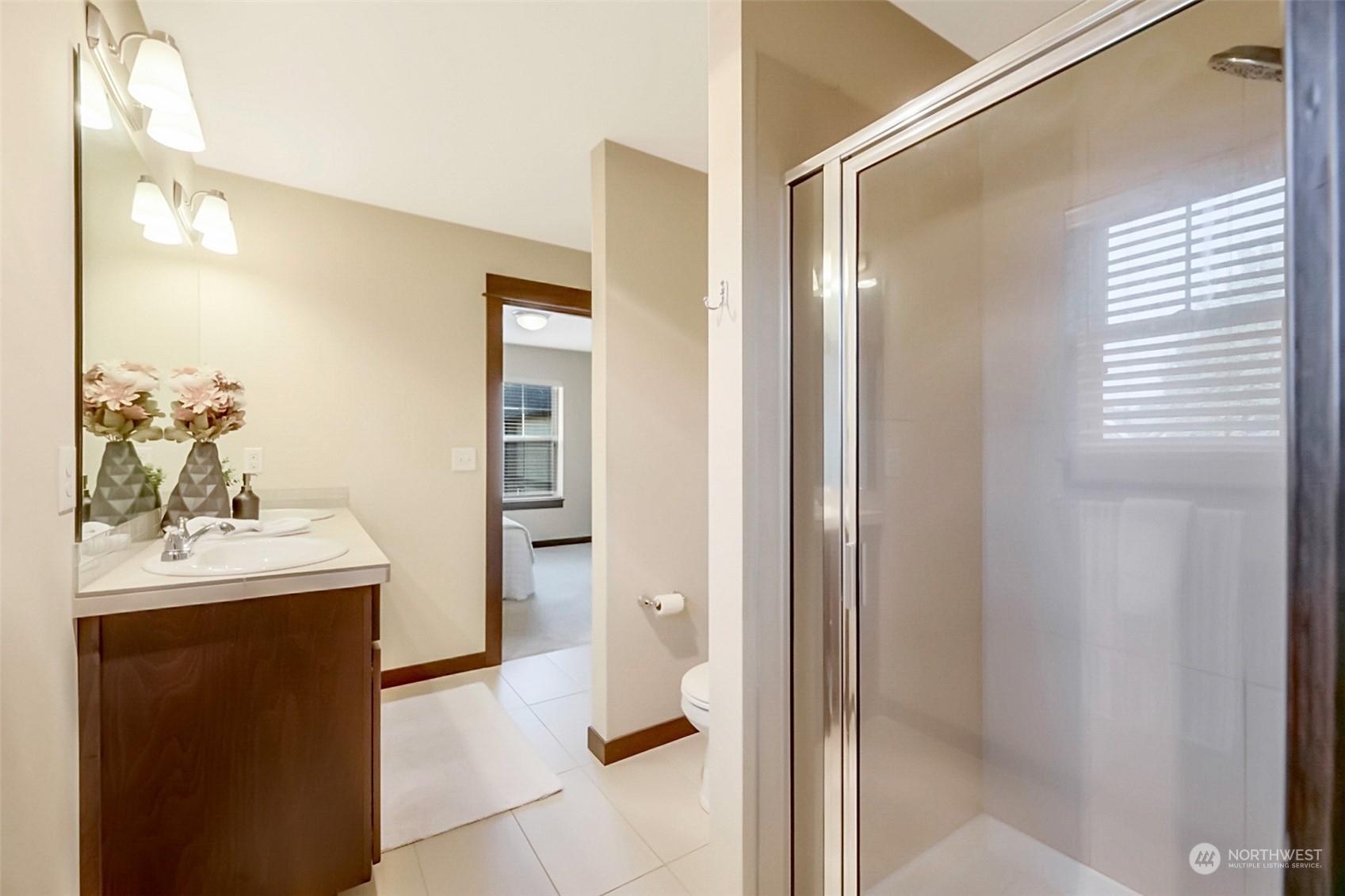 7100 Shinkle Place Southwest Seattle, WA 98106 - Photo 36 of 40 a bathroom with a sink a toilet and shower
