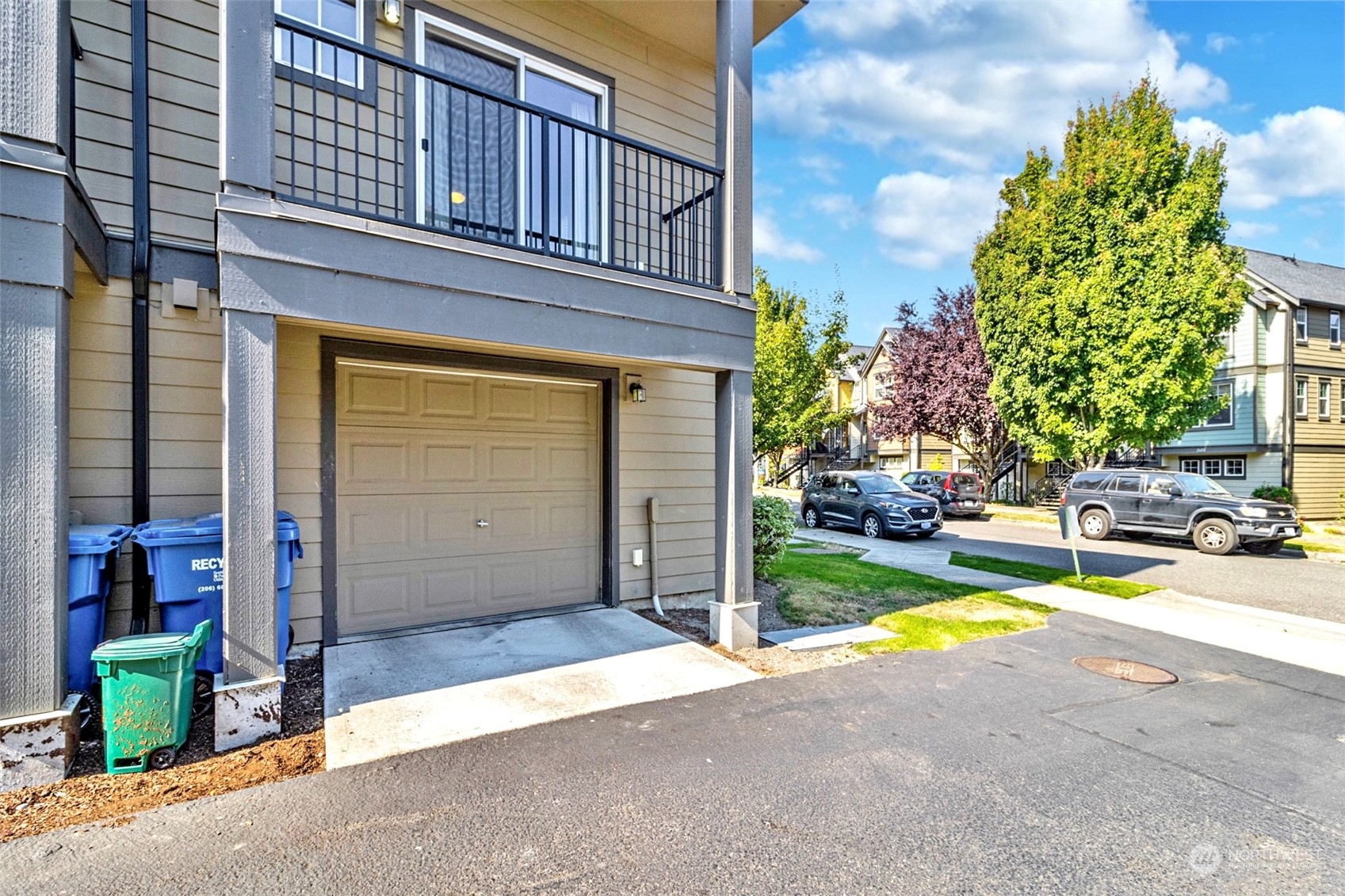 7100 Shinkle Place Southwest Seattle, WA 98106 - Photo 39 of 40 a view of a patio with table and chairs and potted plants