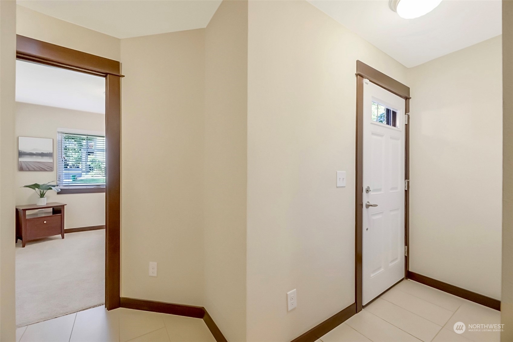 7100 Shinkle Place Southwest Seattle, WA 98106 - Photo 4 of 40 a view of an entryway with a livingroom