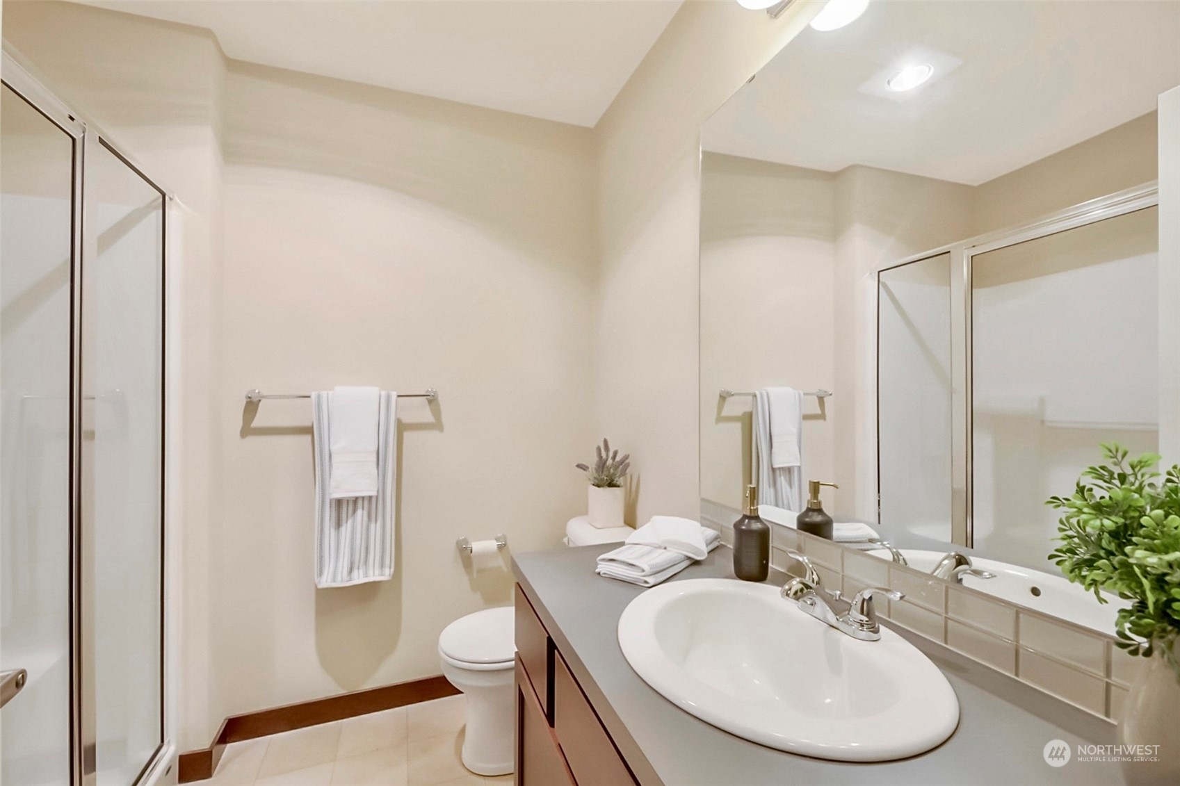 7100 Shinkle Place Southwest Seattle, WA 98106 - Photo 8 of 40 a bathroom with a sink toilet and shower