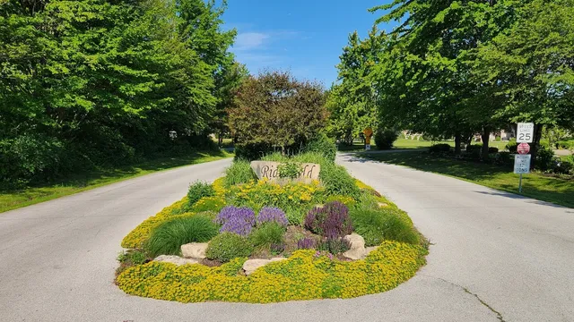 a view of a wooden floor with a fire pit