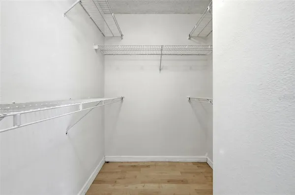 a view of an empty walk in closet
