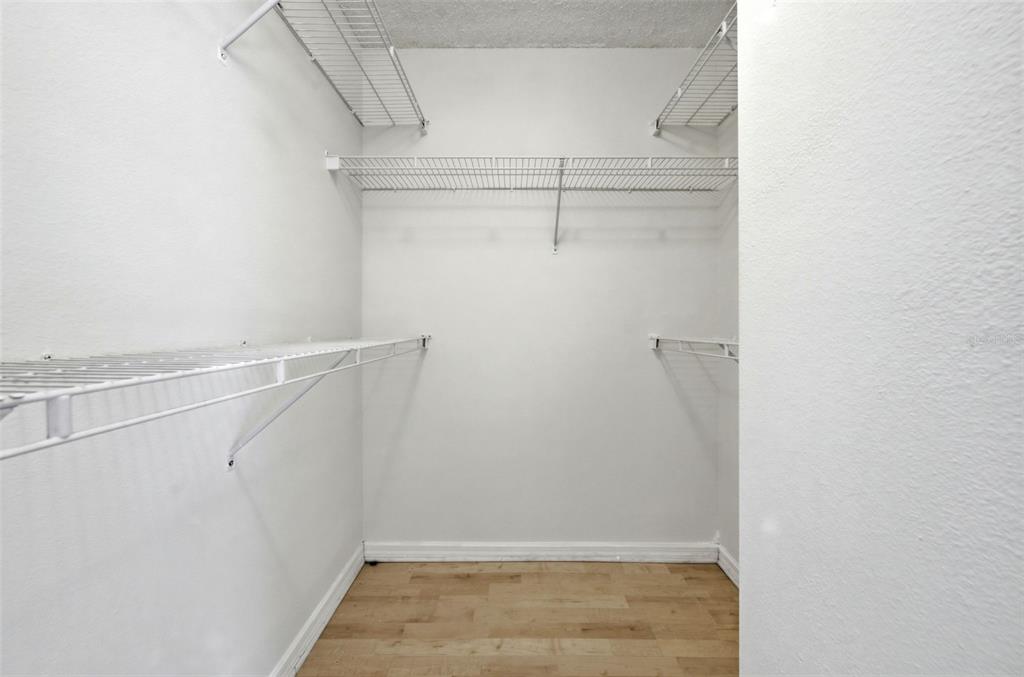 2227 Brancaster Circle Ocoee, FL 34761 - Photo 21 of 30 a view of an empty walk in closet