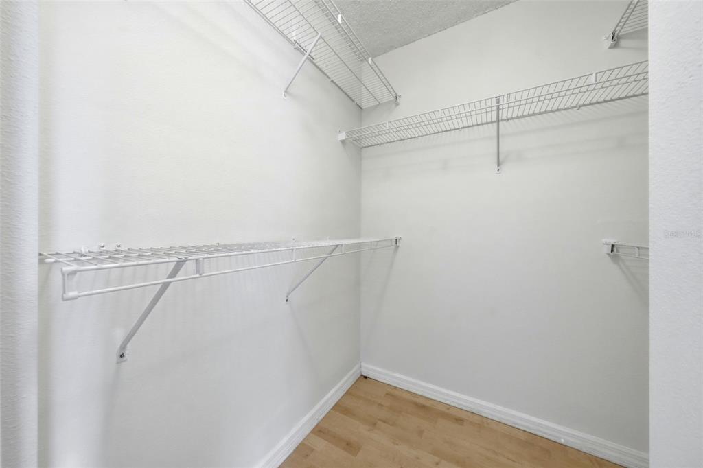 2227 Brancaster Circle Ocoee, FL 34761 - Photo 22 of 30 a view of a room with racks on the wall