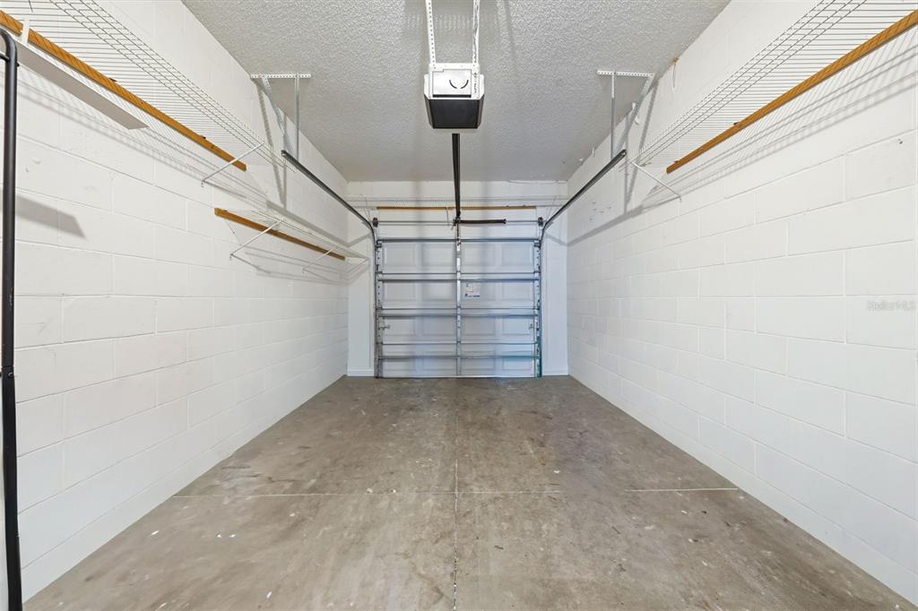 2227 Brancaster Circle Ocoee, FL 34761 - Photo 26 of 30 a view of a hallway with staircase