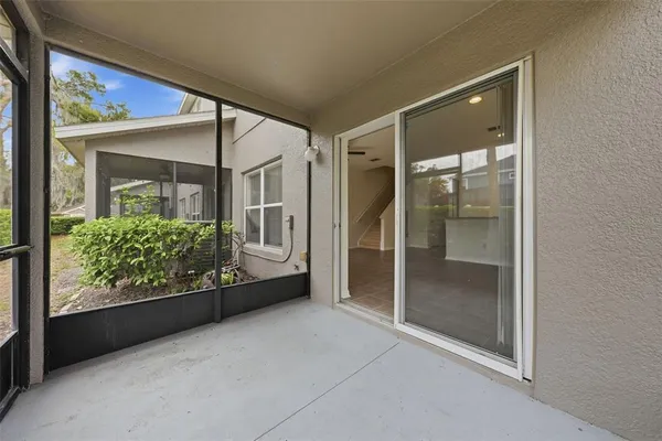 a view of a entryway door of the room