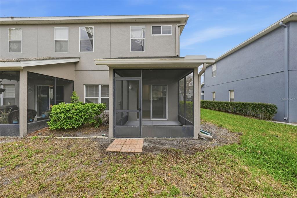 2227 Brancaster Circle Ocoee, FL 34761 - Photo 30 of 30 a front view of a house with garden