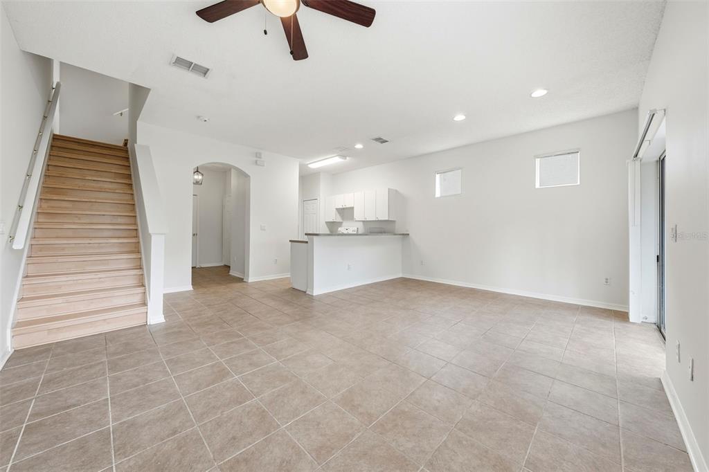 2227 Brancaster Circle Ocoee, FL 34761 - Photo 7 of 30 a view of a kitchen with a sink and cabinets