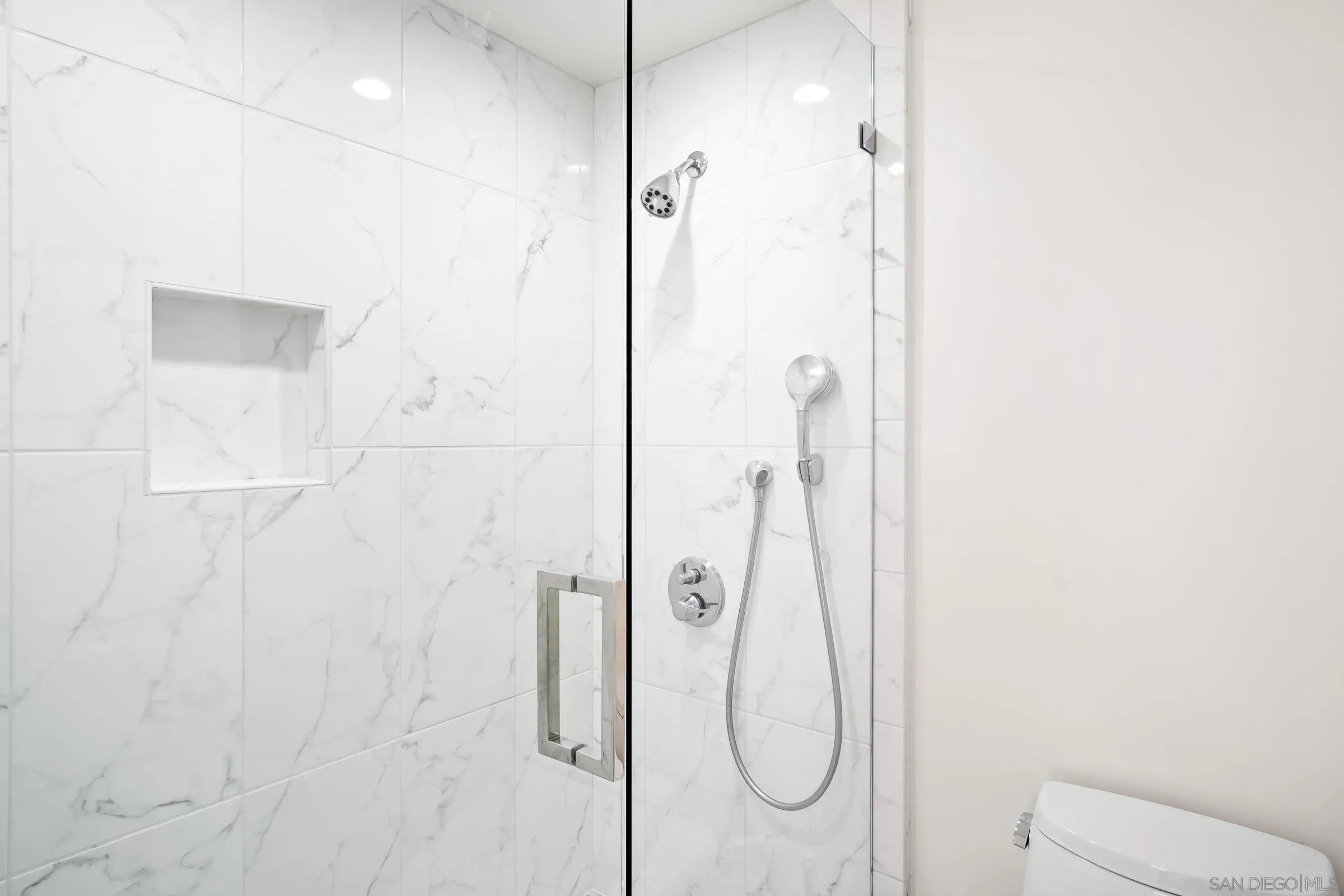 100 Coast Boulevard, Unit 302 La Jolla, CA 92037 - Photo 12 of 21 a bathroom with a shower