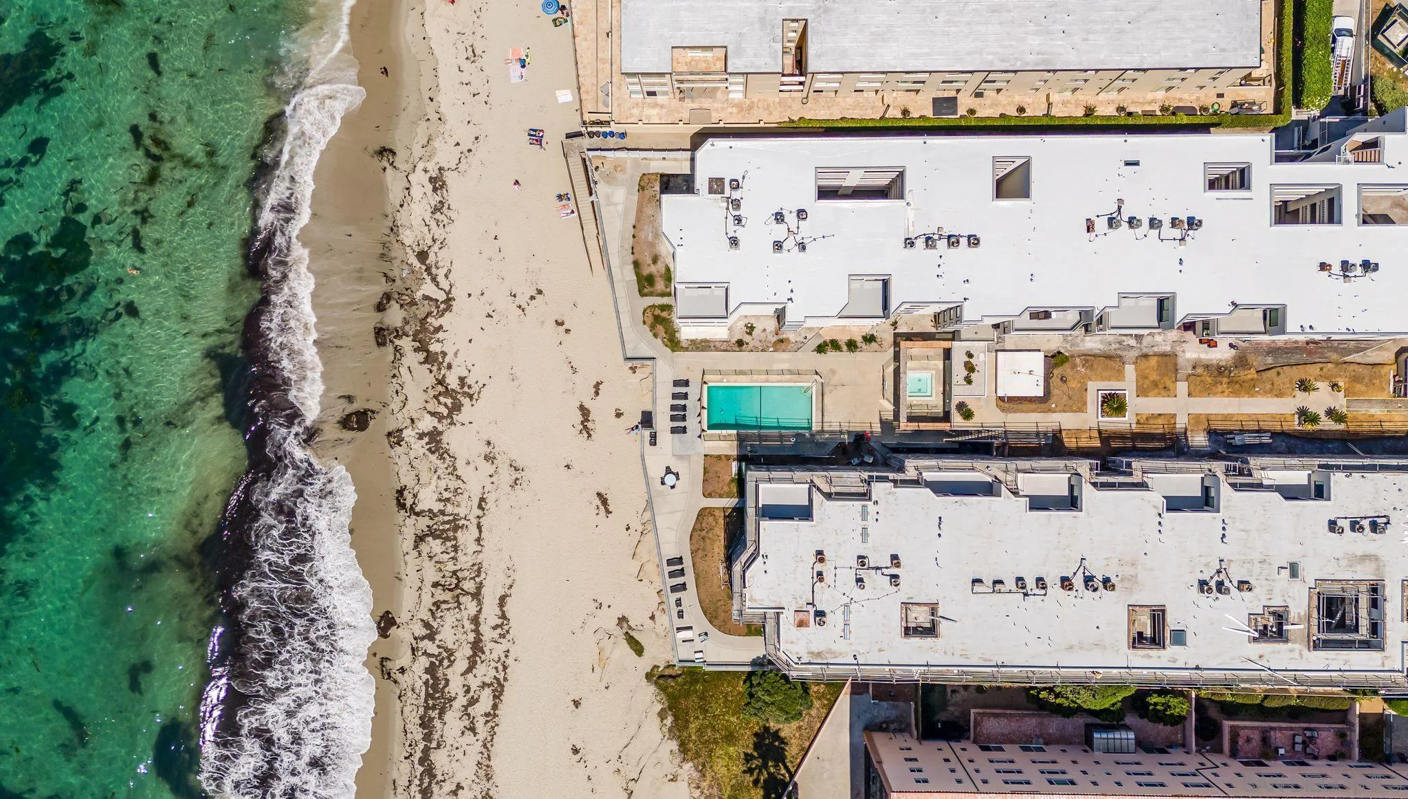 100 Coast Boulevard, Unit 302 La Jolla, CA 92037 - Photo 4 of 21 a building with trees in front of it