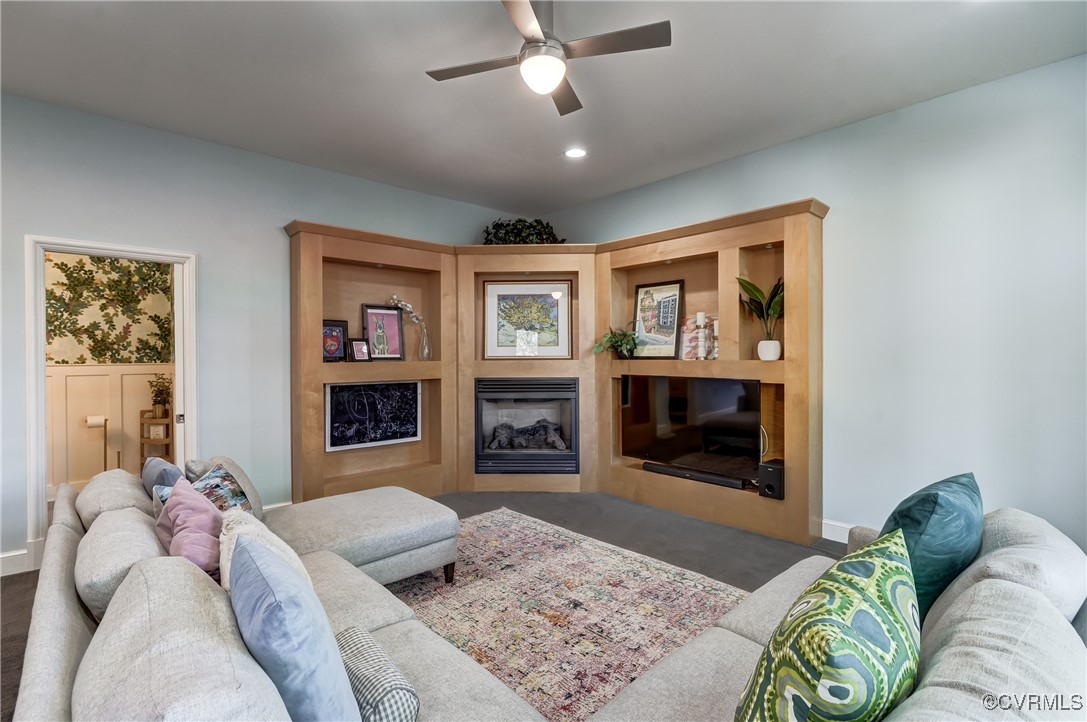 3906 Brook Road Richmond, VA 23227 - Photo 21 of 50 a living room with furniture and a fireplace