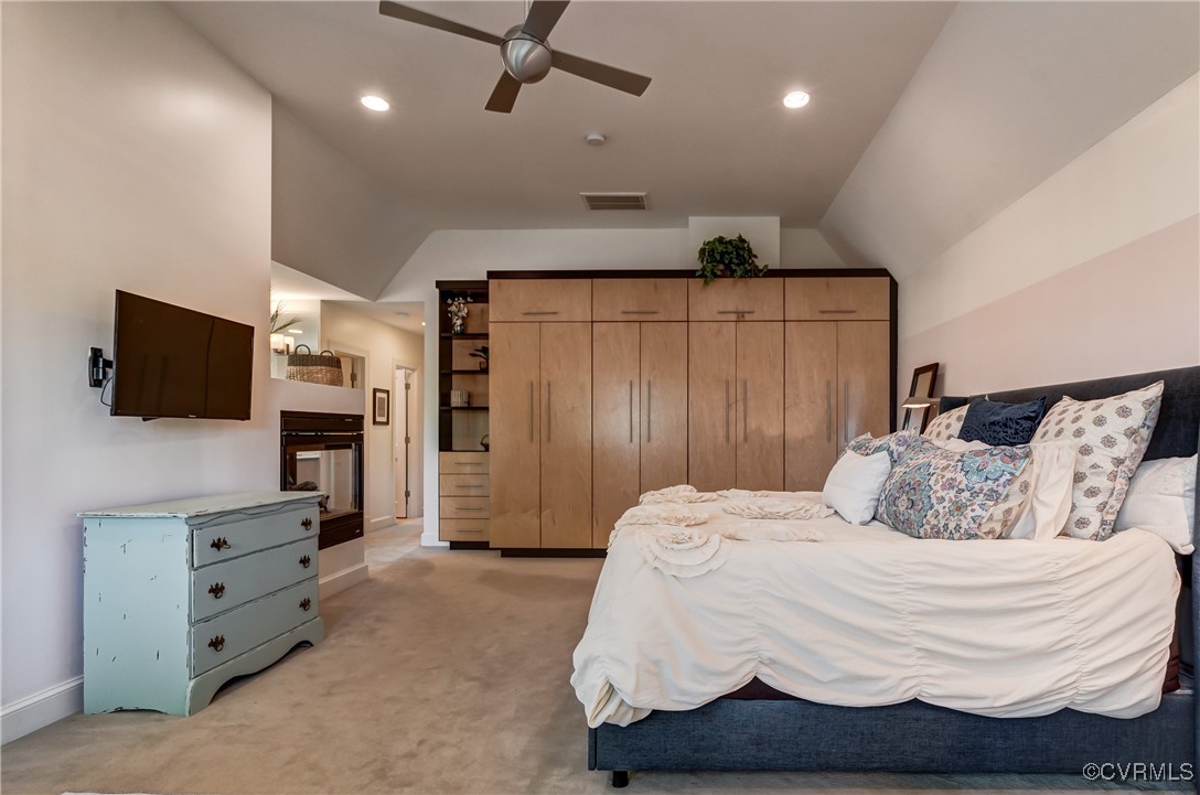 3906 Brook Road Richmond, VA 23227 - Photo 33 of 50 a bedroom with a bed and flat screen tv