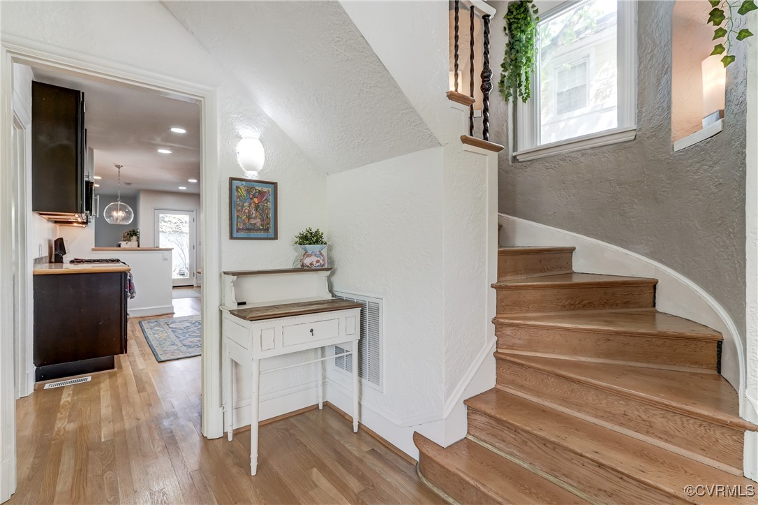3906 Brook Road Richmond, VA 23227 - Photo 6 of 50 a view of entryway and kitchen with wooden floor