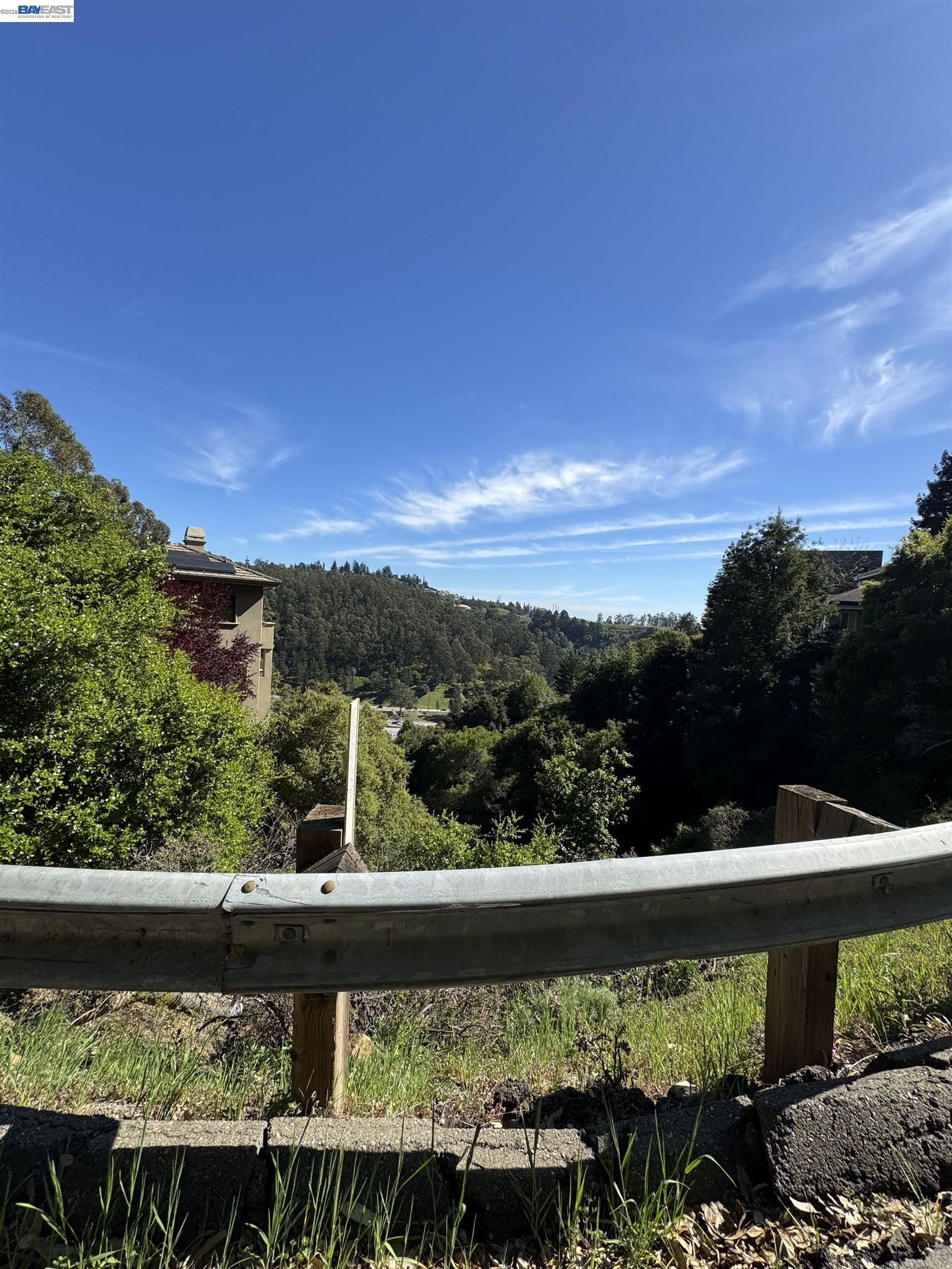 0 Charing Cross Road Berkeley, CA 94705 - Photo 16 of 19 a view of a lake with a yard