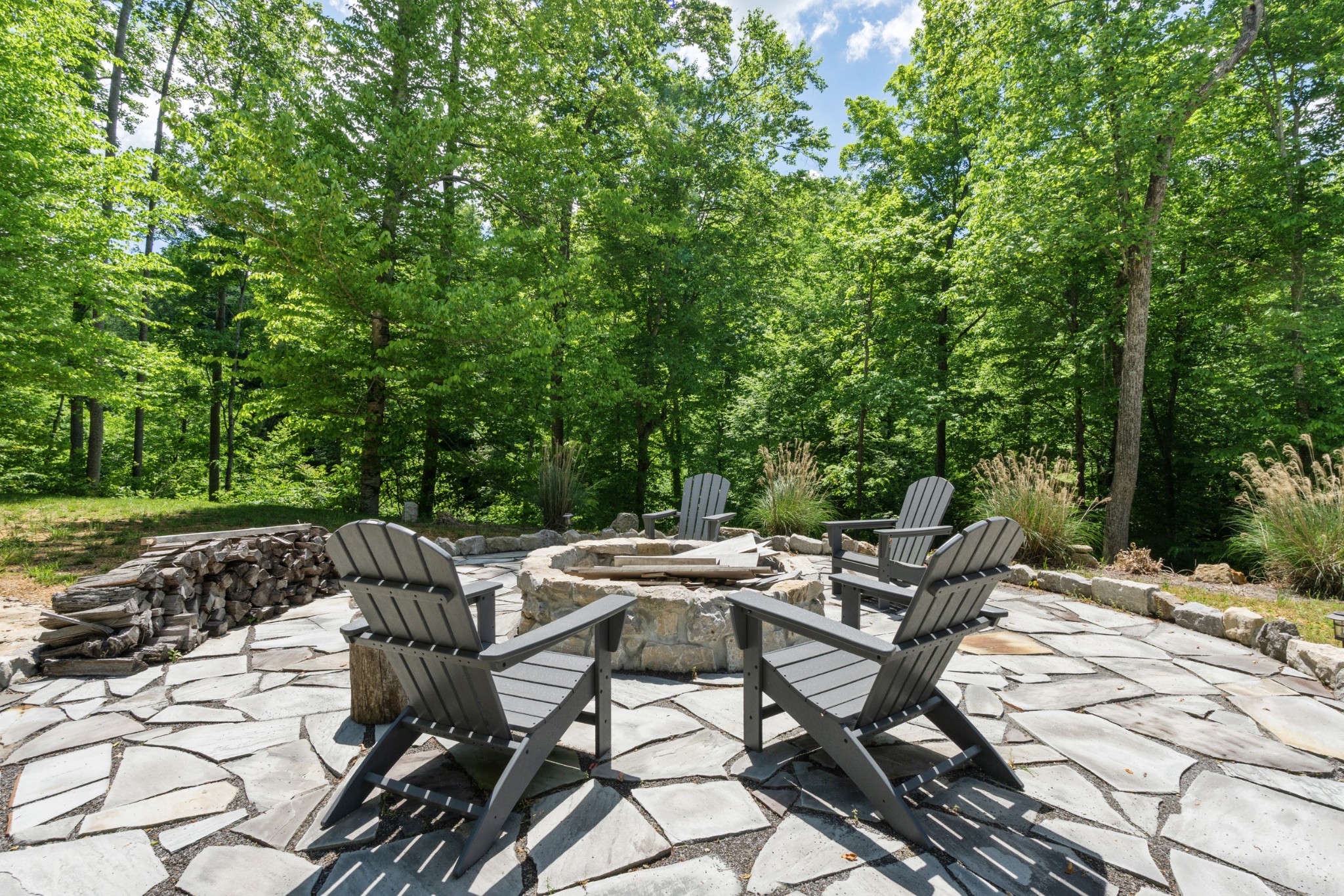 3560 Tyree Springs Road Hendersonville, TN 37075 - Photo 3 of 46 a view of a patio with table and chairs and potted plants