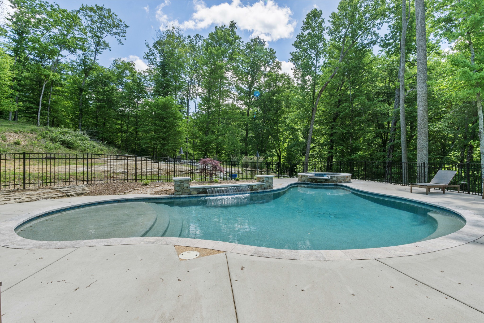 3560 Tyree Springs Road Hendersonville, TN 37075 - Photo 4 of 46 a view of a swimming pool with a yard