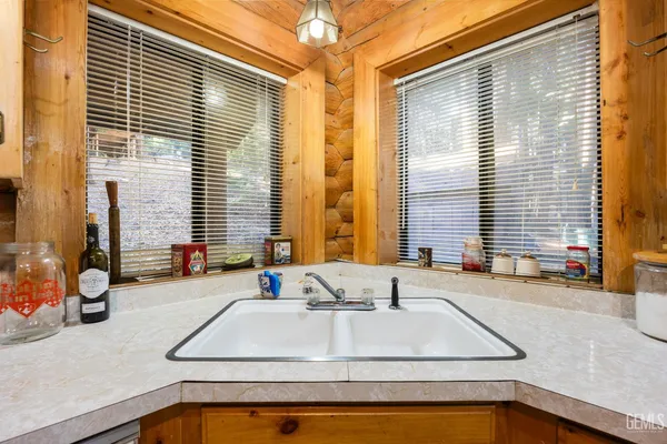 a view of living room with a large window