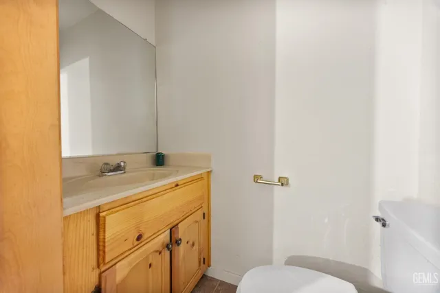 a bathroom with a sink and toilet