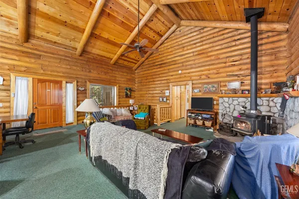 a bed room with furniture and a window