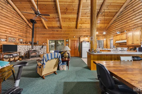 a view of a swimming pool with seating area