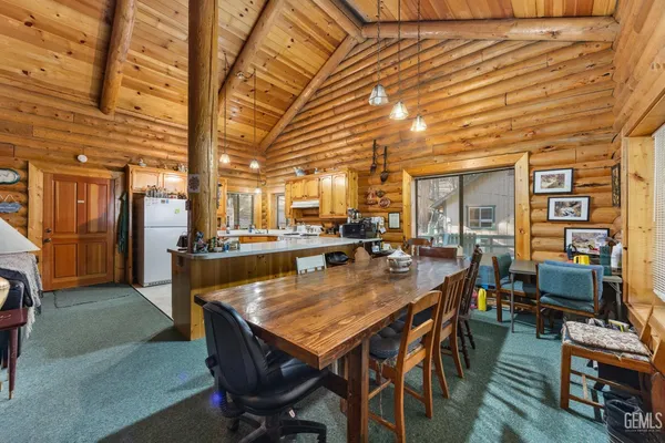 a view of a dining room with furniture