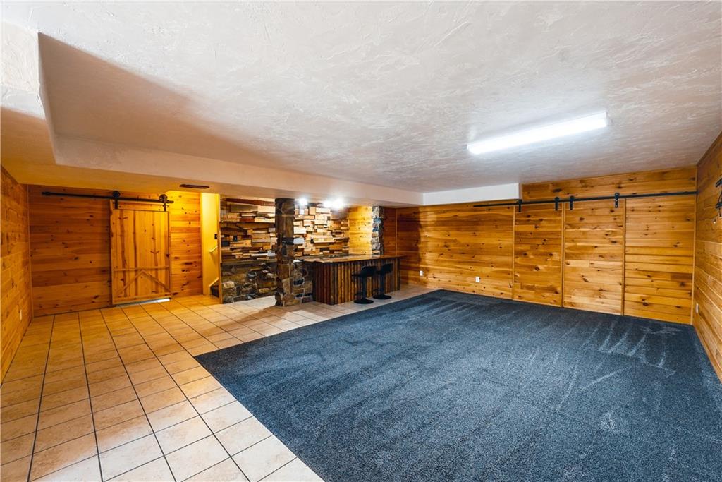 505 October Court Pittsburgh, PA 15239 - Photo 17 of 23 a view of a room with gym equipment