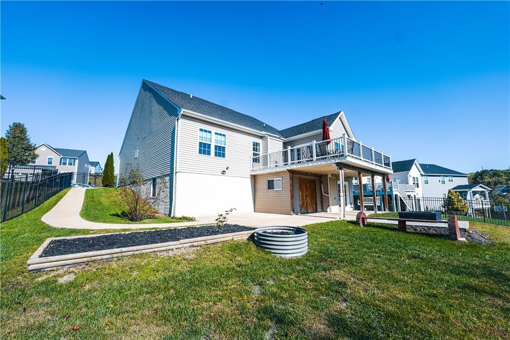 505 October Court Pittsburgh, PA 15239 - Photo 22 of 23 a front view of a house with a yard table and chairs
