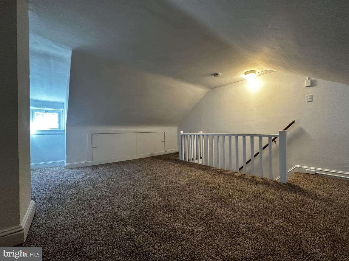 342 Valley Road Coatesville, PA 19320 - Photo 4 of 9 a view of an empty room with stairs