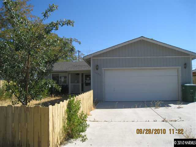 1690 Laiolo Drive Reno, NV 89502 - Photo 1 of 6 a front view of a house with a yard