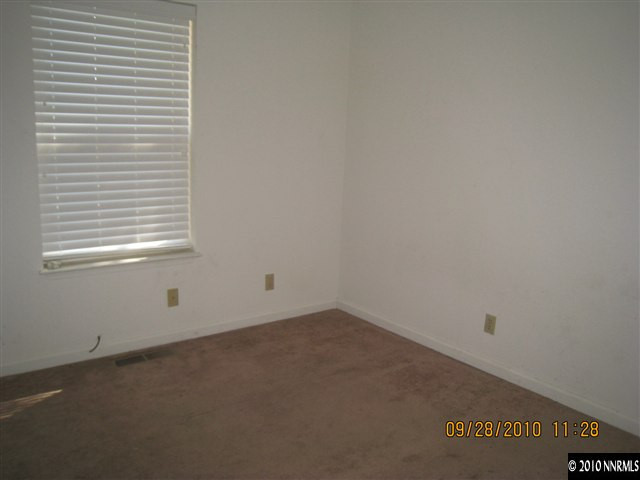 1690 Laiolo Drive Reno, NV 89502 - Photo 6 of 6 an empty room with a window