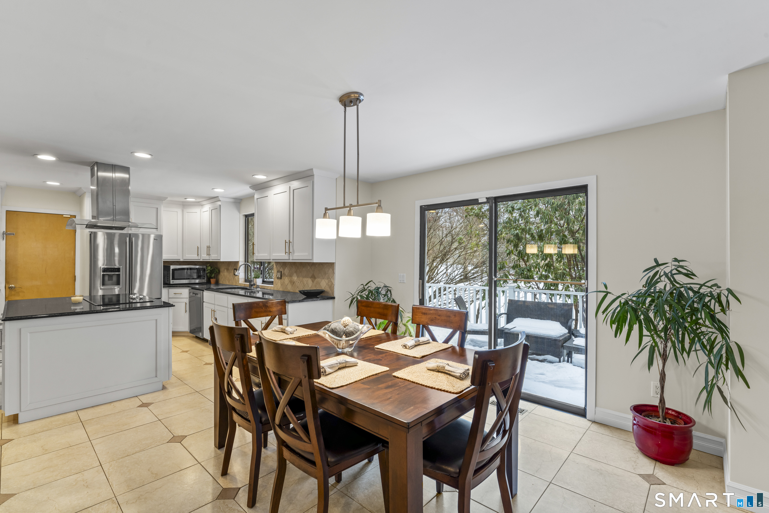 211 Pinewood Road Stamford, CT 06903 - Photo 14 of 38 a dining room with furniture and window