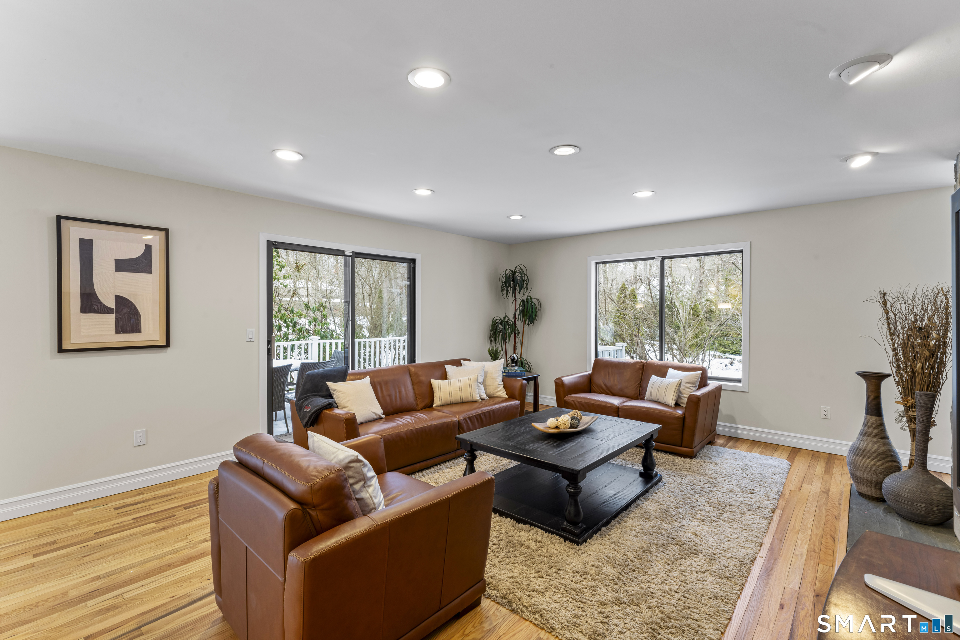 211 Pinewood Road Stamford, CT 06903 - Photo 17 of 38 a living room with furniture and a large window