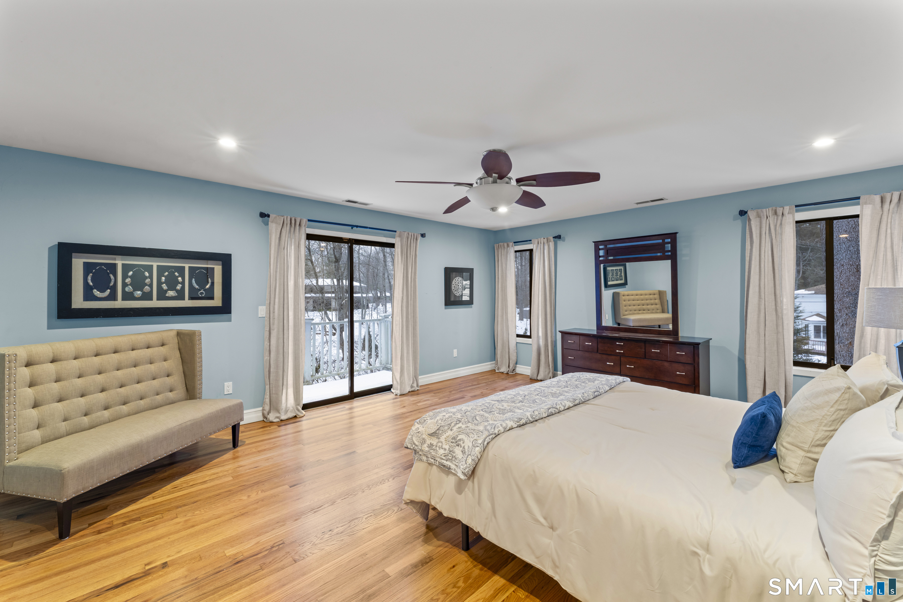 211 Pinewood Road Stamford, CT 06903 - Photo 21 of 38 a bedroom with a large bed and a tv