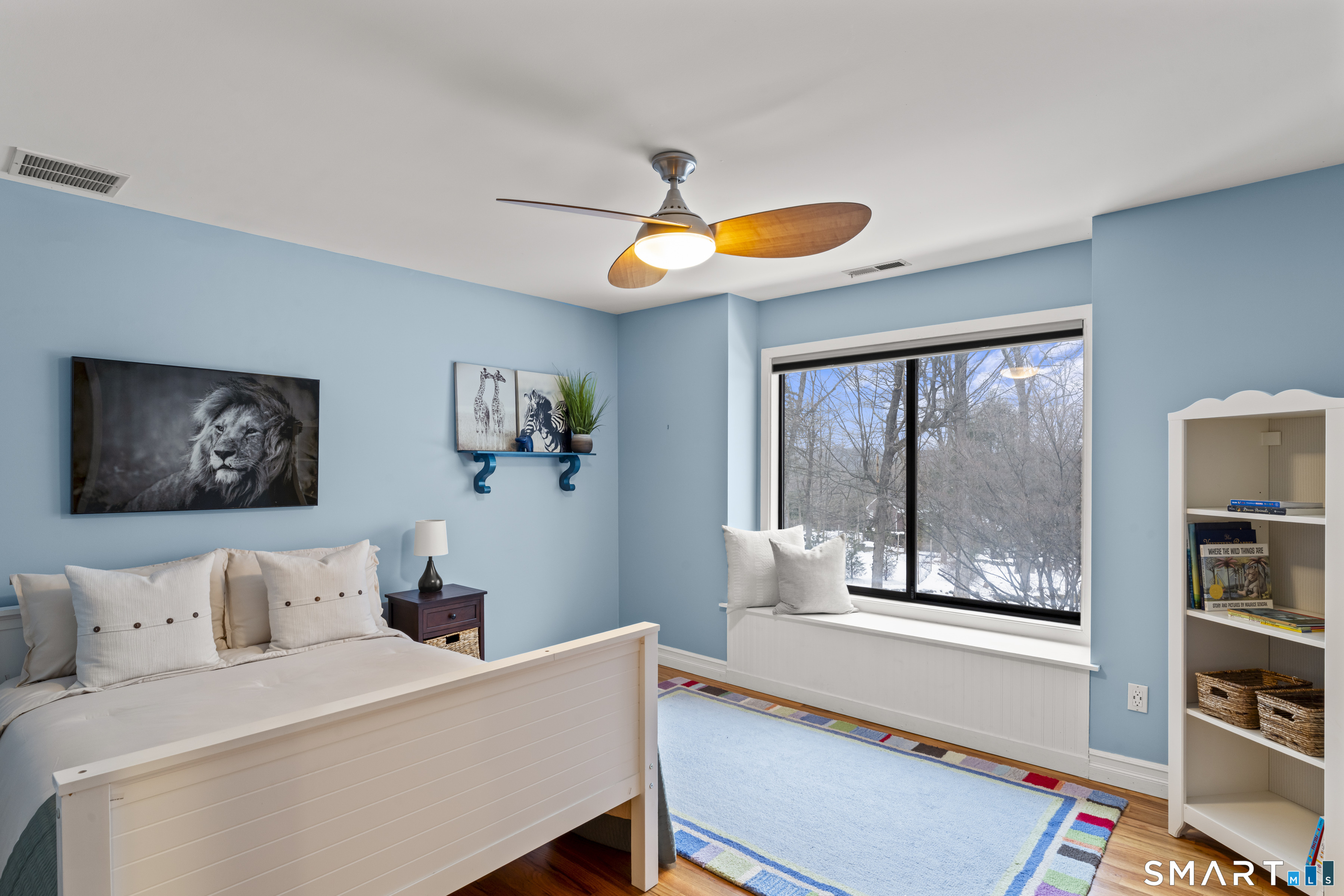211 Pinewood Road Stamford, CT 06903 - Photo 24 of 38 a living room with furniture and a floor to ceiling window